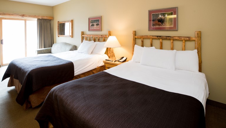 The two queen beds in the Deluxe Queen Suite